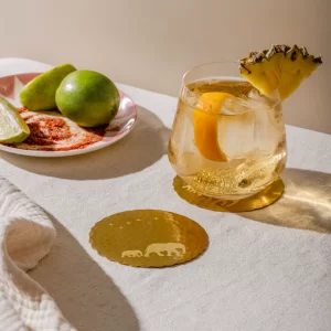 Masion Lustré Elephant coasters styled on table