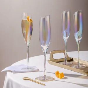Set of opalescent champagne flutes styled for celebration