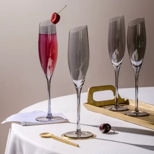Set of slate champagne flutes on dining table